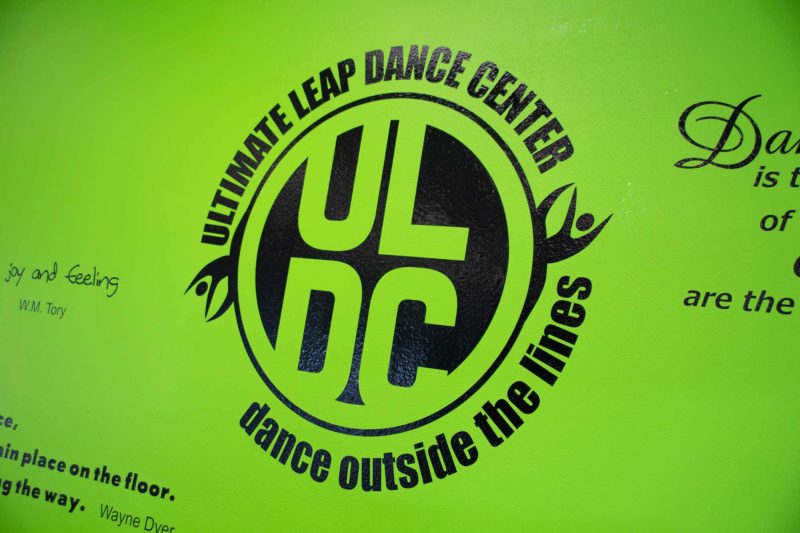 Ultimate Leap Dance Center Green Wall with Logo